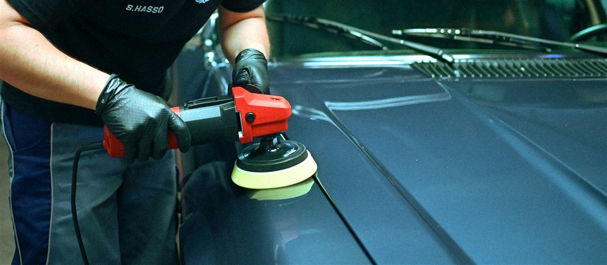 Orbital buffer action shot during paint correction